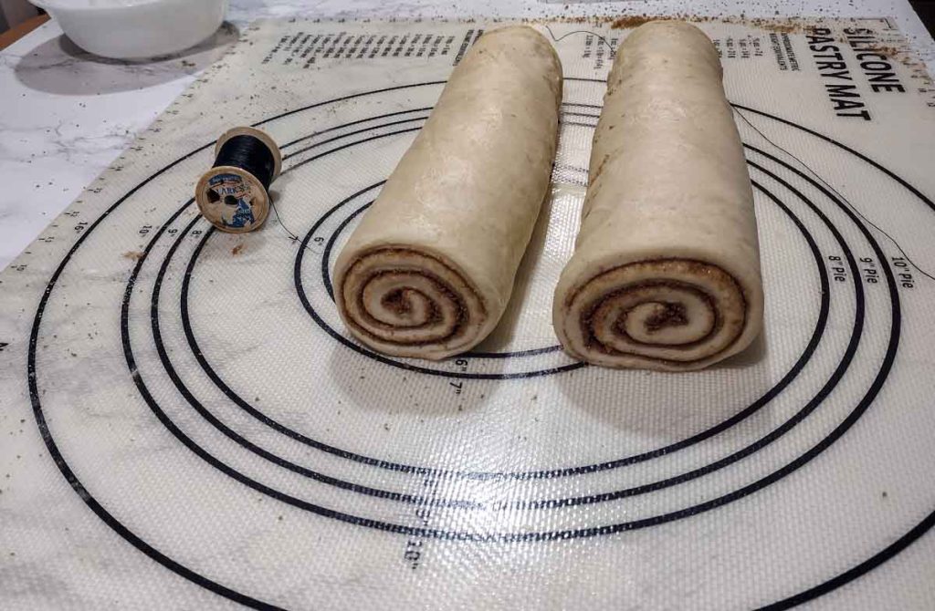 cinnamon roll on a mat