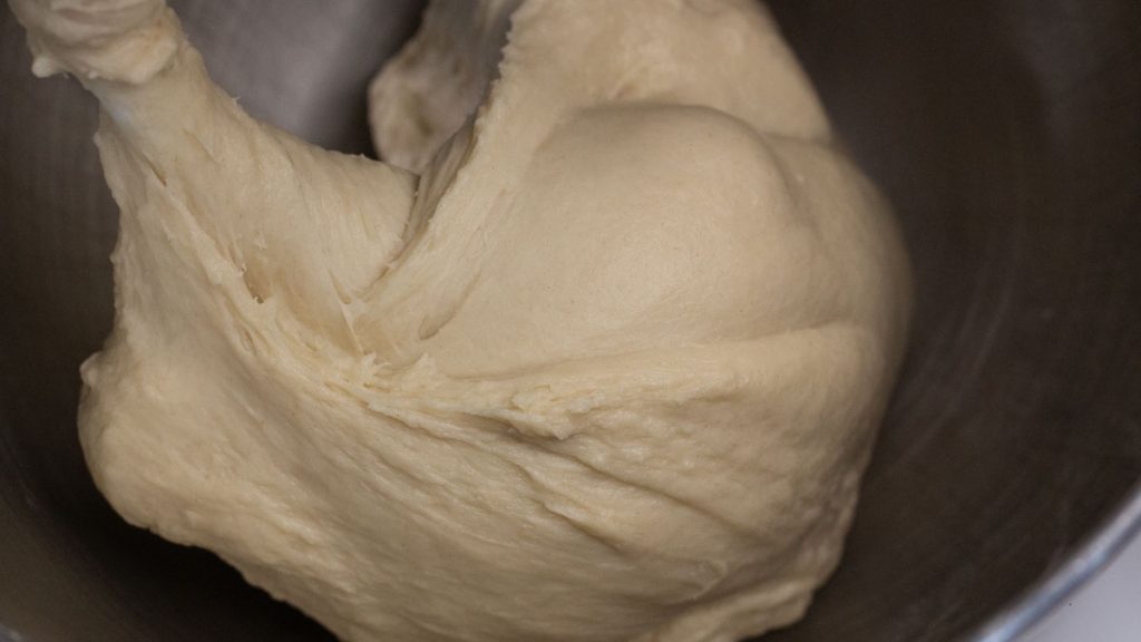 sourdough sandwich bread wet dough inside mixing bowl